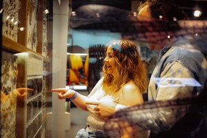 Adults enjoying child-free access to Melbourne Museum during Nocturnal: Museum After dark.