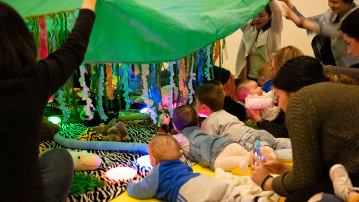  Parents and babies participating in the Baby Sensory Play activity in the STEM Learning LAB during the Little Kids' Day In program at Scienceworks.
