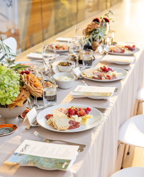 Seated dinner at Melbourne Museum, with themed dining setup alongside a private viewing of ROME: Empire, Power, People. Source: Museums Victoria