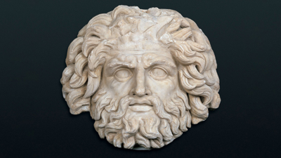 Stone mask of the roman god Jupiter.