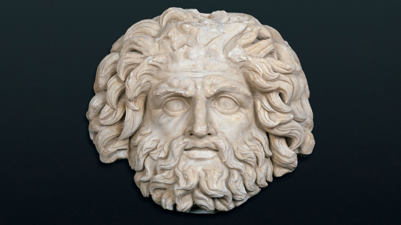Stone mask of the roman god Jupiter.