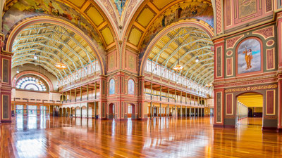 Ornate murals and frescoes adorning the interior walls of the Royal Exhibition building.