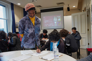 Culture Makers artist Olana Janfa running Culture Makers Lab with young people at the Immigration Museum