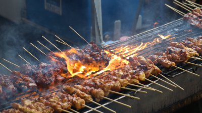 Chicken kebabs on a flame grill