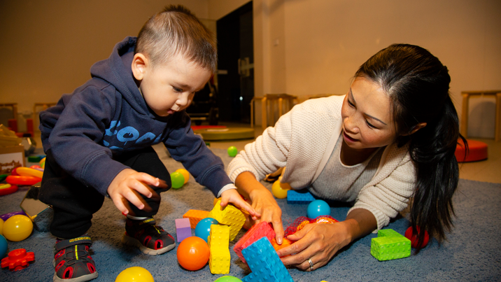 Mother and small child playing with blocks at Tiny Tinkerers at Scienceworks.