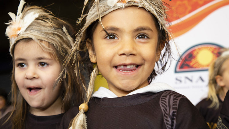 Children celebrating First Peoples presentation.