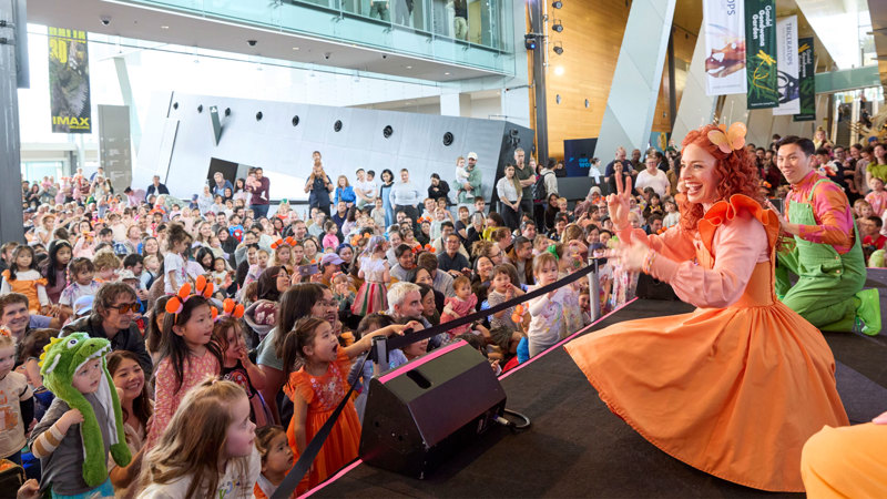 Emma Memma performing on stage at Melbourne Museum.