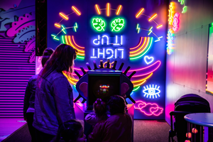 Children playing in Illuminate Exhibition.