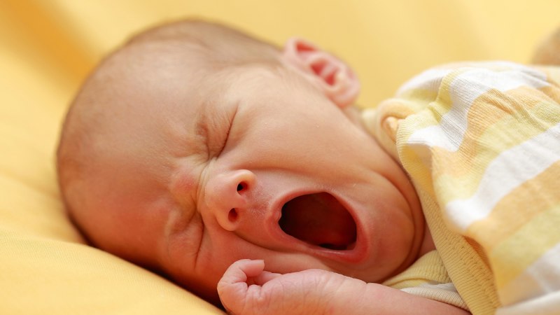 A baby yawning