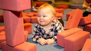  Baby playing with the blocks in the Toddler play area during First Peoples Little Kids Day In at Scienceworks, August 2018