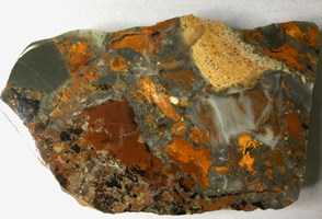 A brown and red textured rock